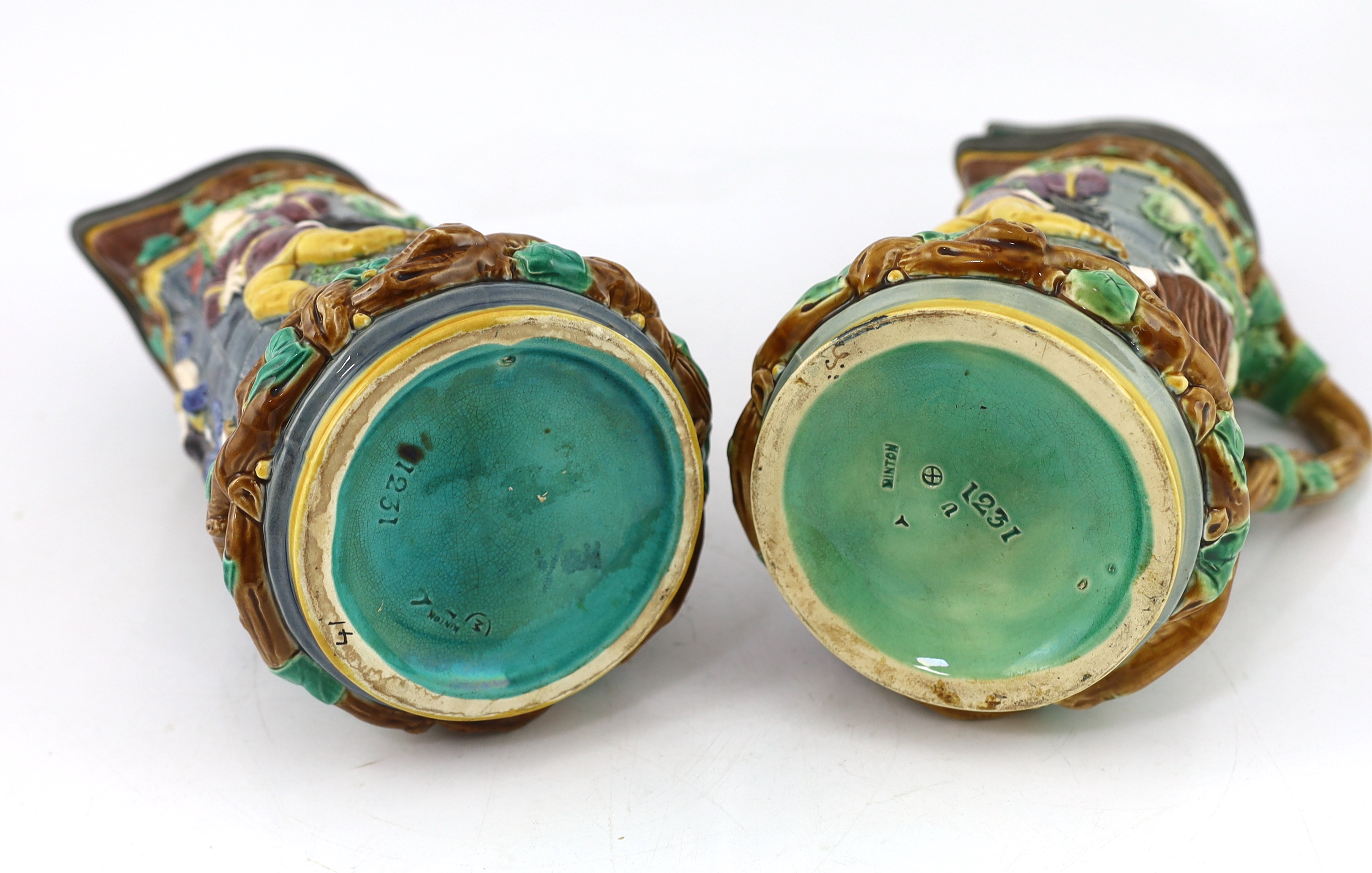 A pair of Victorian Minton majolica ‘Tower’ jugs, 33cm high